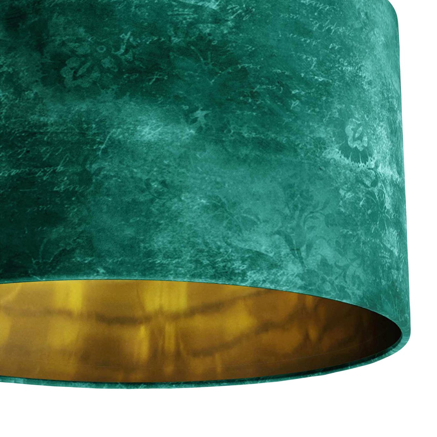 Close up of green distressed velvet lampshade with gold lining