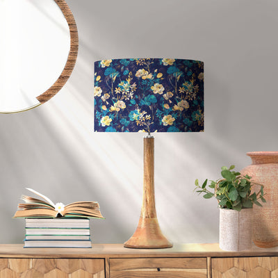 Navy Blue Gold Flower Lampshade with Mirror Silver Lining, pictured on wood lamp base in living room setting