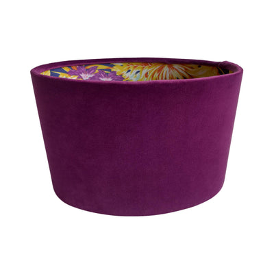 Oval lampshade in mulberry purple velvet with purple and gold tropical lining, front picture