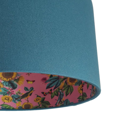 close up of the Teal Blue Cotton Lampshade with Birds and Sunflowers in Pink