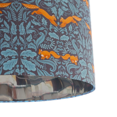 close up of the Squirrel Woodland Teal Blue Cotton Lampshade with Mirror Silver